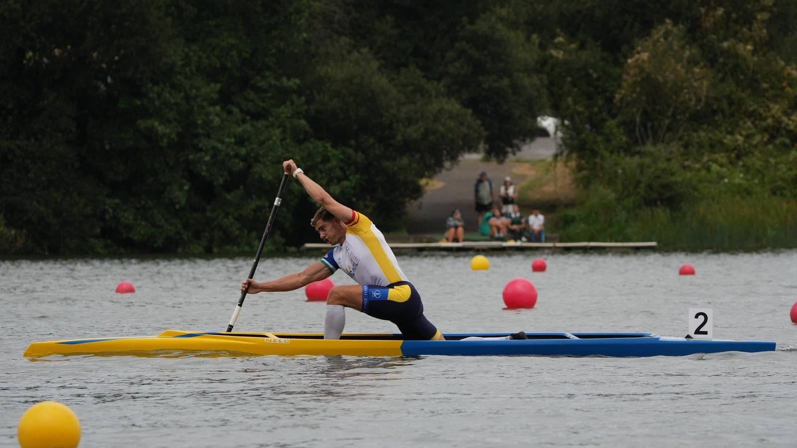 Jaime racing a sprint canoe