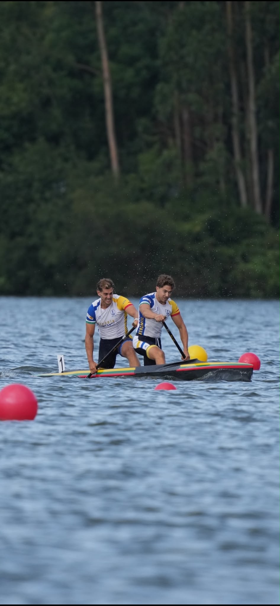 Jaime racing in a C2 canoe